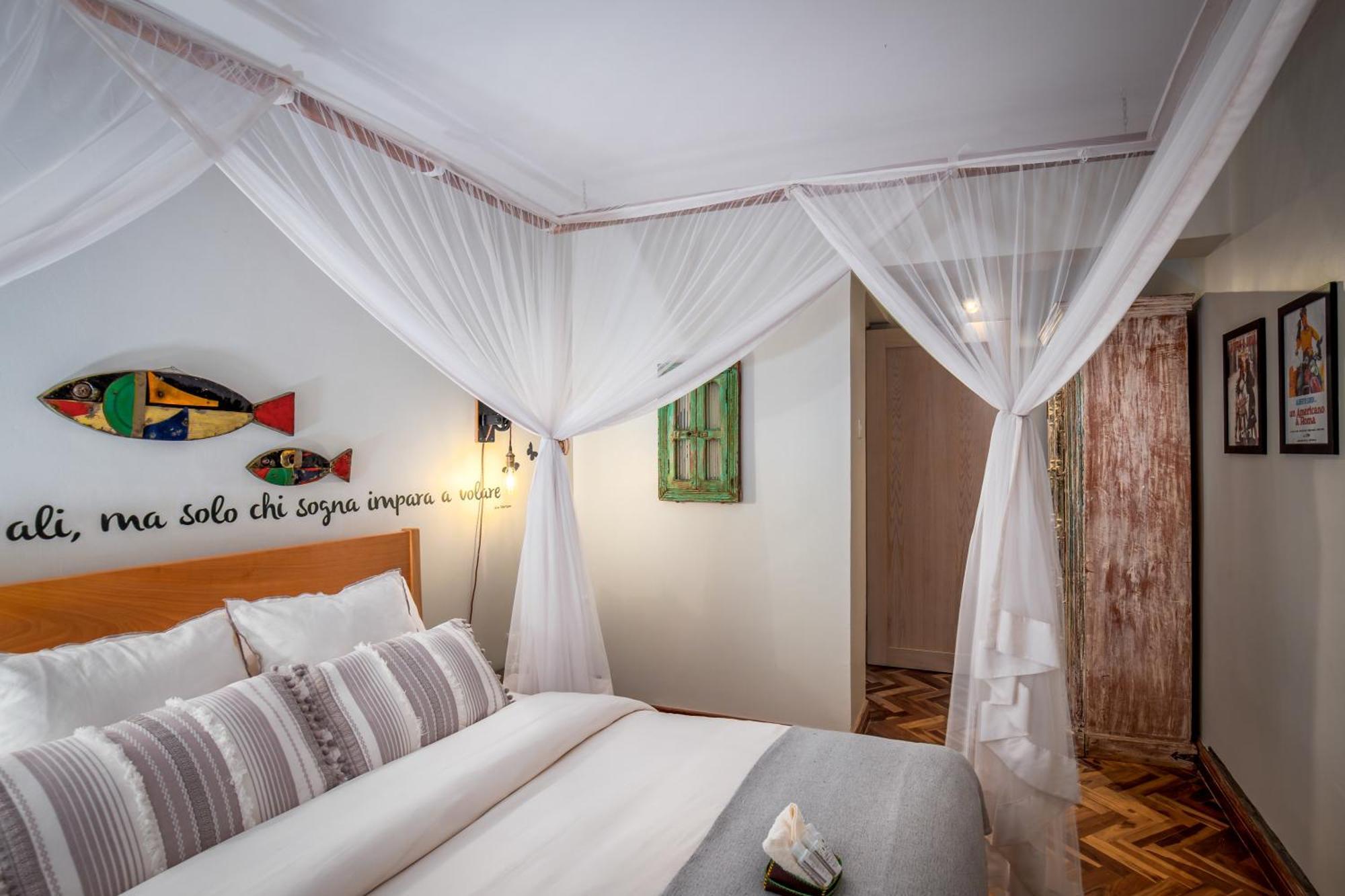 Bed and Breakfast Ewange - A Casa Mia Кампала Номер фото